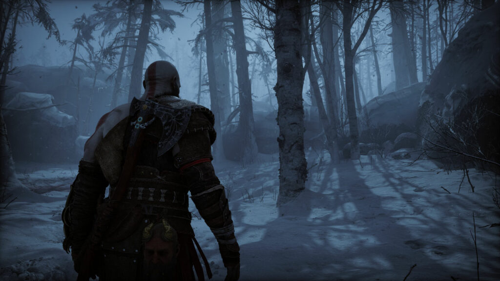 Kratos walking through a snow area early in God of War Ragnarok