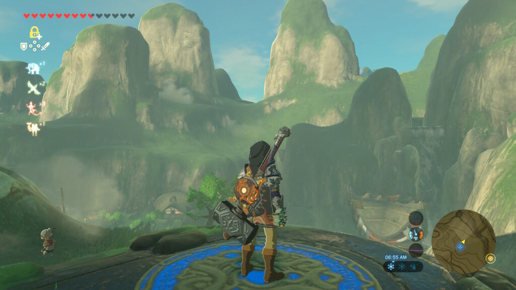 Link at the site of a shrine looking towards the mountains in the distance