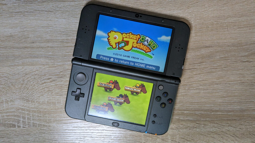 The start-up screen for Pocket Card Jockey on a Nintendo 3DS